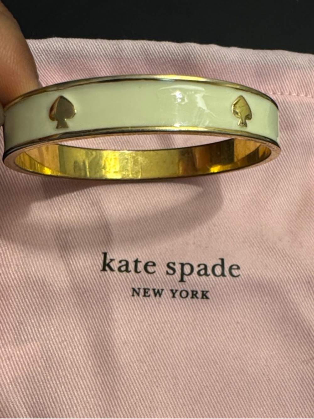 kate spade cream and gold enamel spade bangle with pink dust bag